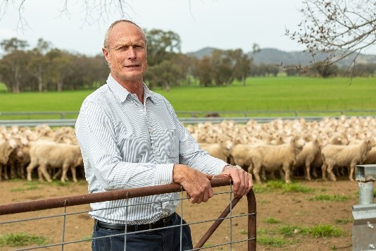 Incoming chair of the NSW Footrot Steering Committee Derek Schoen stands at a farm gate
