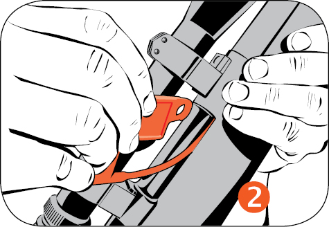 2. With the bolt open, slide the firearm safety flag up into the breech.