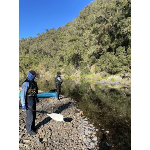 Fisheries Officers patrolling Northern NSW River by canoe 